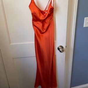 BEAUTIFUL orange dress with a a front twist and hidden zipper